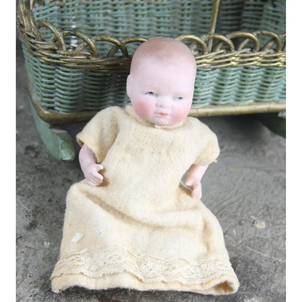 Antique One-Of-A-Kind Miniature China Doll in Wicker Cradle
